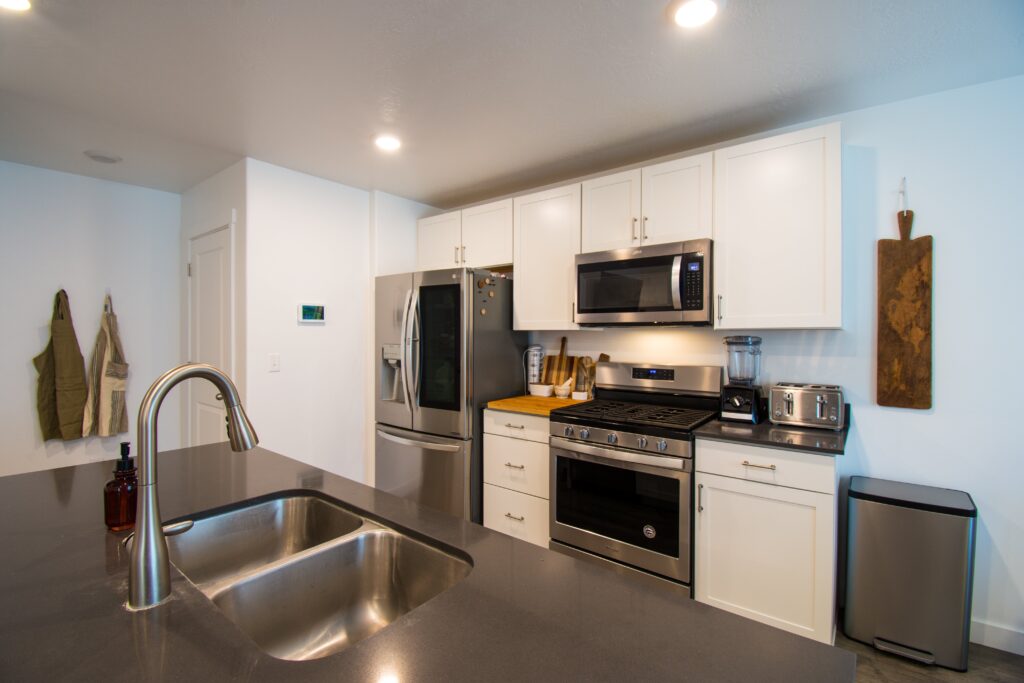 A kitchen with stainless steel appliances.