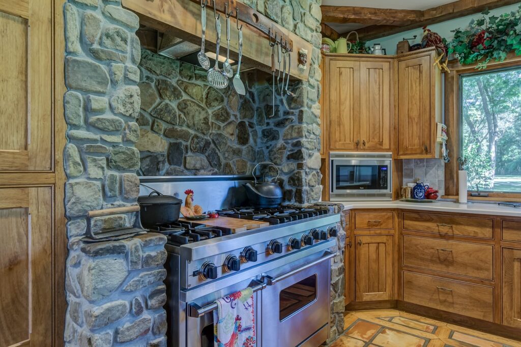 a kitchen with stone counter tops and a stove.
