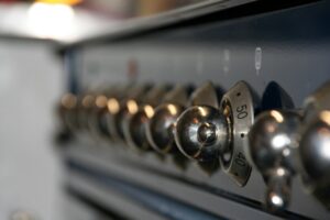 a close up of the knobs on a stove.