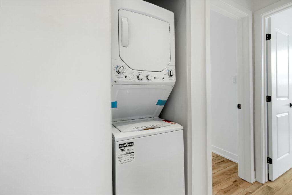 a laundry room with a washer and dryer in it.