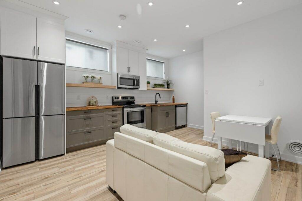 A kitchen and living room in a small apartment.