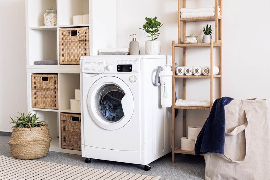 A laundry room with a washing machine and baskets.
